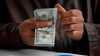 المركزي العراقي يحدد سعر صرف الدينار عند 1520 مقابل الدولار